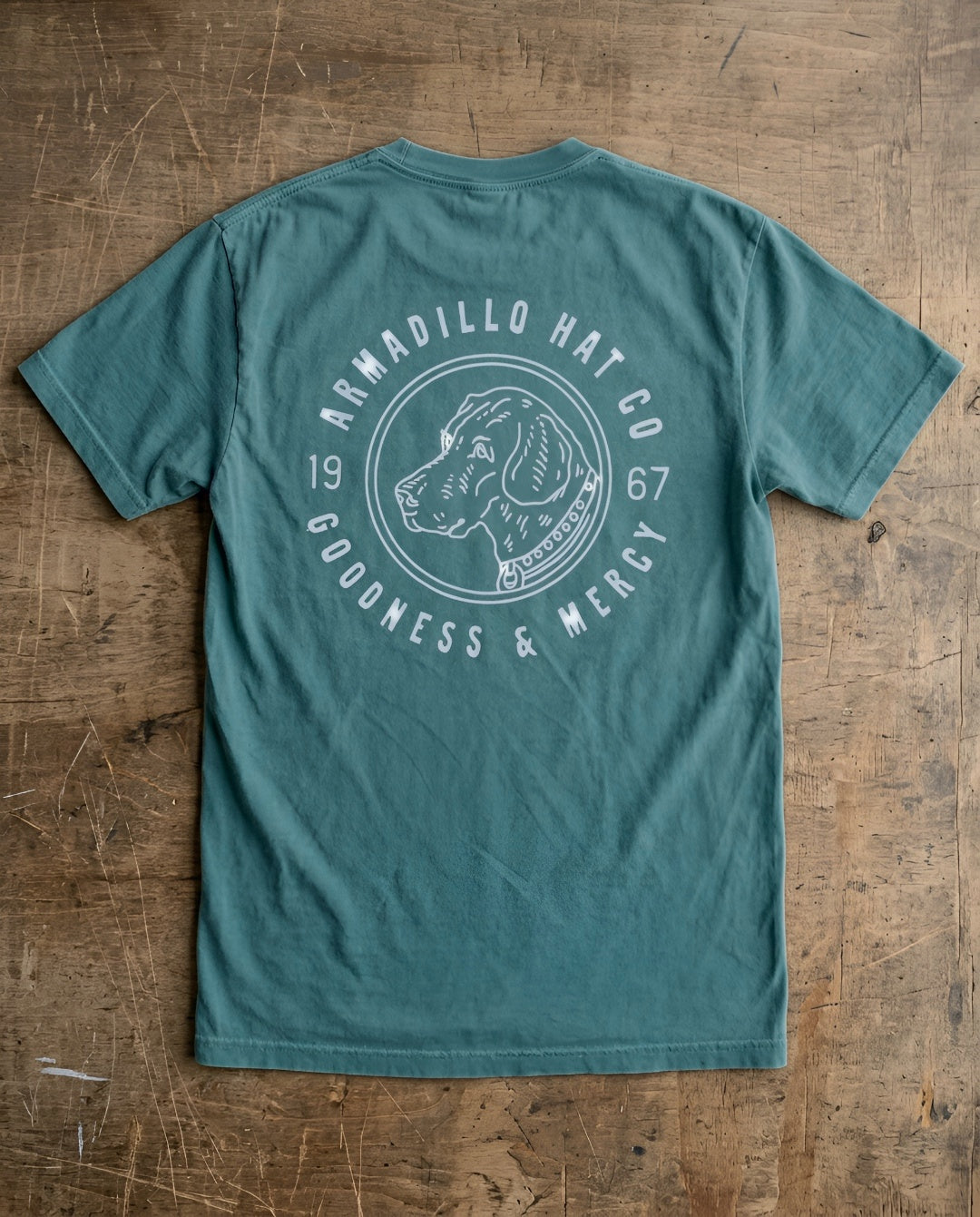 Bird Dog Tee back print — dog badge with Goodness & Mercy, Psalm 23:6, on Comfort Colors 1717 Blue Spruce